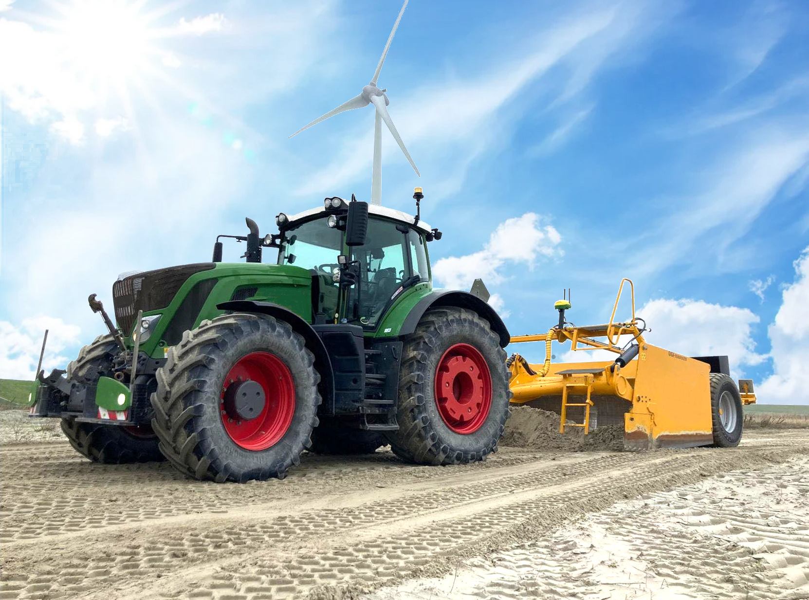 Fendt tractor working with a scraper and implement-mounted receiver
